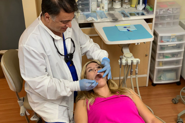woman at dentist having root canal