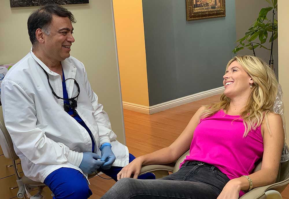 Bruce Vafa DDS with her patient