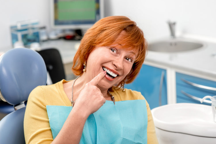 senior women with natural dentures