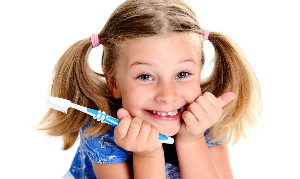 happy girl with healthy teeth