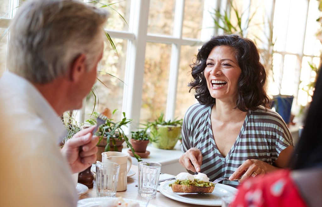 Happy woman with Dental Implants